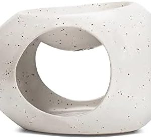 Artistic oil diffuser for aromatic home ambiance.