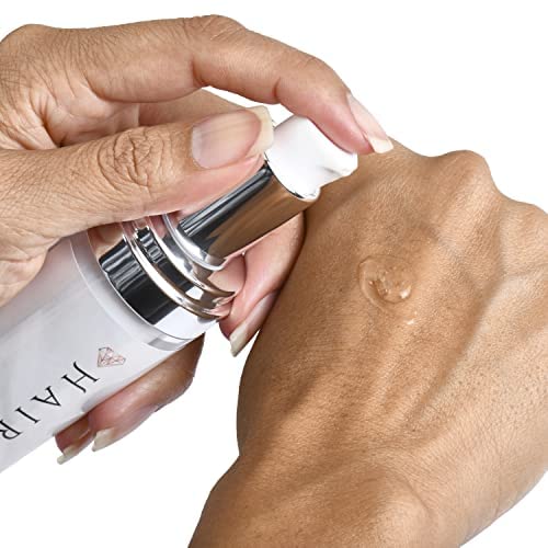 Krastase Anti Frizz Serum: Tames frizz for smooth hair. - Image 7