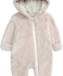 Cream baby snowsuit with hood and pom-pom trim.