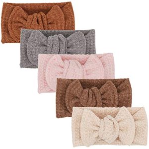 Cream bow headband for babies.
