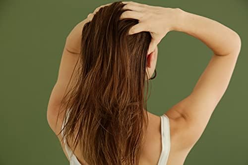 Argan oil scalp massage for healthier hair. - Image 8
