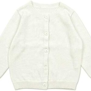 Cream knit cardigan for babies.