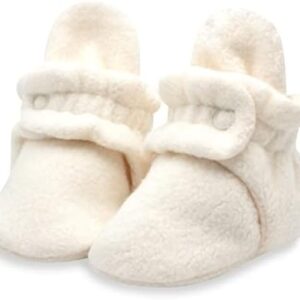 Cream trainers for babies.