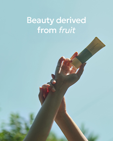 Hand holding product with blue sky