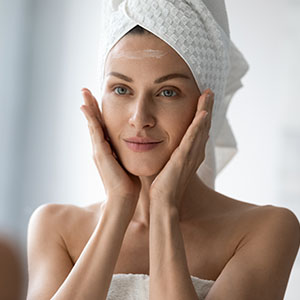 Apply a thin layer to your face and neck, gently massaging the skin with your fingertips