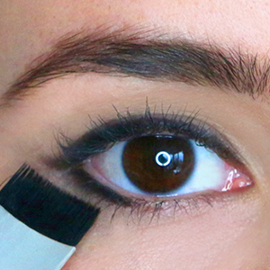use the arc brush to stamp shadow onto lower lash line