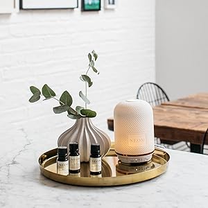 NEOM wellbeing pod diffuser with essential oil blends