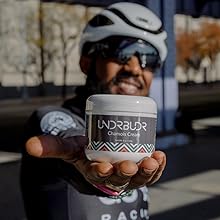 cyclist holding chamois cream