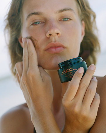 woman applying alitura meteorite facial scrub exfoliation hydration soothing pure ingredients