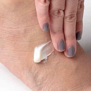Applying Foot Miracle Therapeutic Lotion to a foot