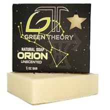 Green Theory Orion soap laying on its side with product packing standing on top