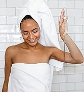 Woman exiting shower door