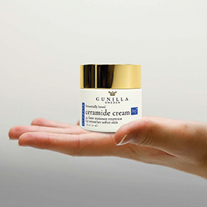 Ceramide Cream A17 jar in woman's hand