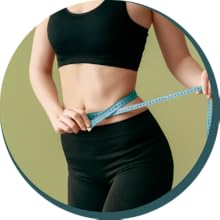 Picture of a woman's waist with a measuring tape around it.