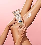 Woman with a swatch of lotion on her leg