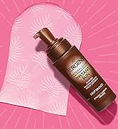 Mitt below a bottle of Jergens Instant Sun Mousse