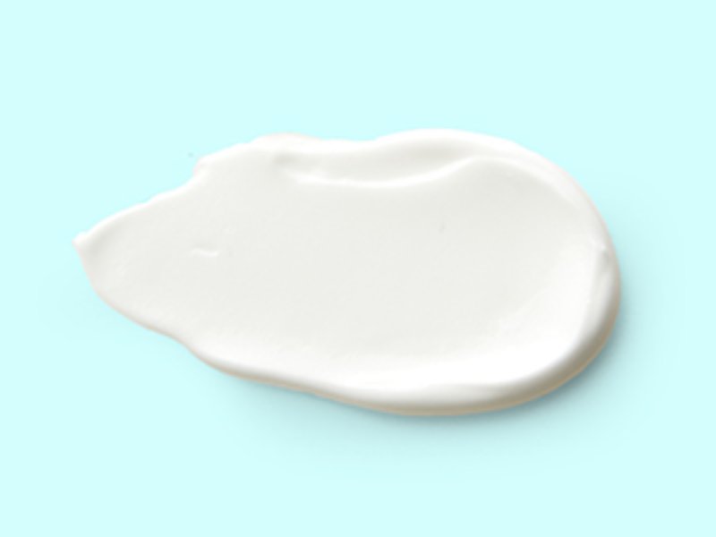 Close up image of white acne spot gel