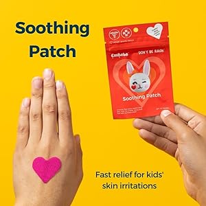 Soothing patch, pink heart shape on a child's hand