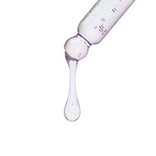 Dropper with a droplet of Ultra-Hydrating Lipids coming out of it.