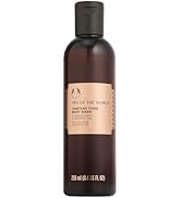 Collection of dark brown cosmetic bottles with minimalist design, displayed against white background. Products appear to be from same product line with varying sizes.