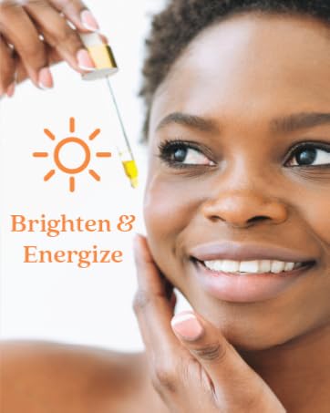 By Nature model using Vitamin C Facial Oil