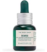 Text reads 'THE BODY SHOP EYE REVIVER'. Small green glass bottle with white cap containing eye serum concentrate.