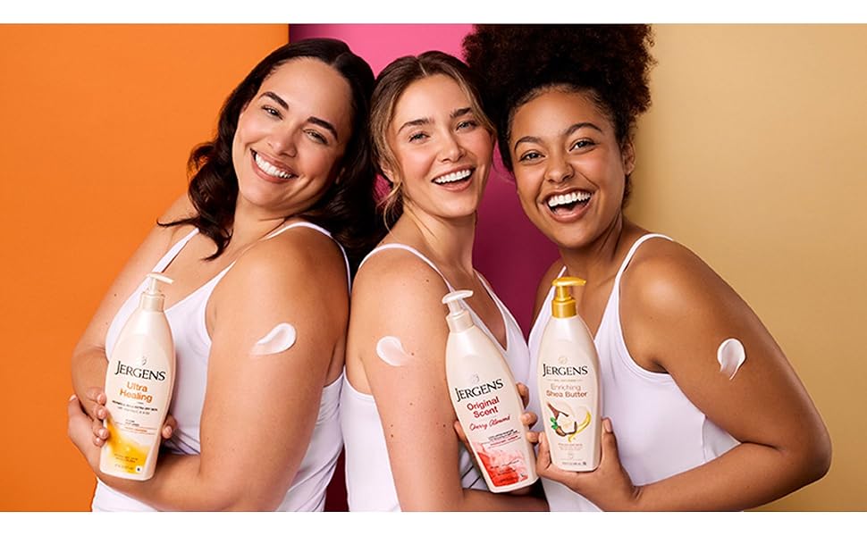 Three women each holding a bottle of Jergens.
