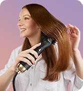 woman using light blow hair brush