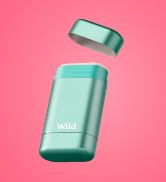 Mint green rectangular portable charger or power bank with rounded edges. Lid separated from main body. Brand name 'Wild' visible on device.