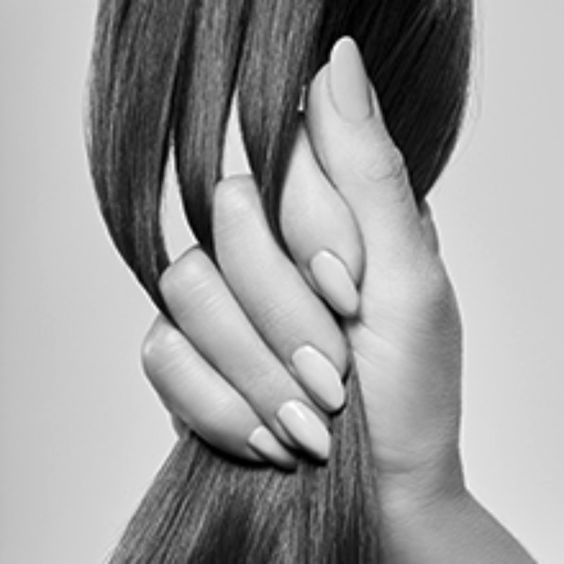 Hand tugging hair