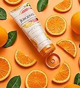 Jergens Citrus Body Butter next to orange slices