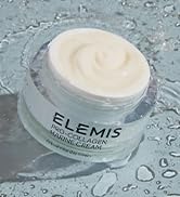 Elemis Pro-Collagen Marine Cream over water droplet background.