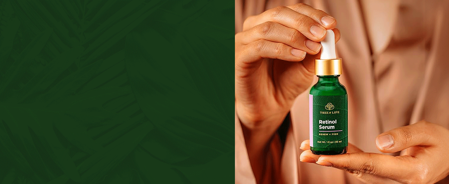 Close up of woman’s hands holding Retinol serum