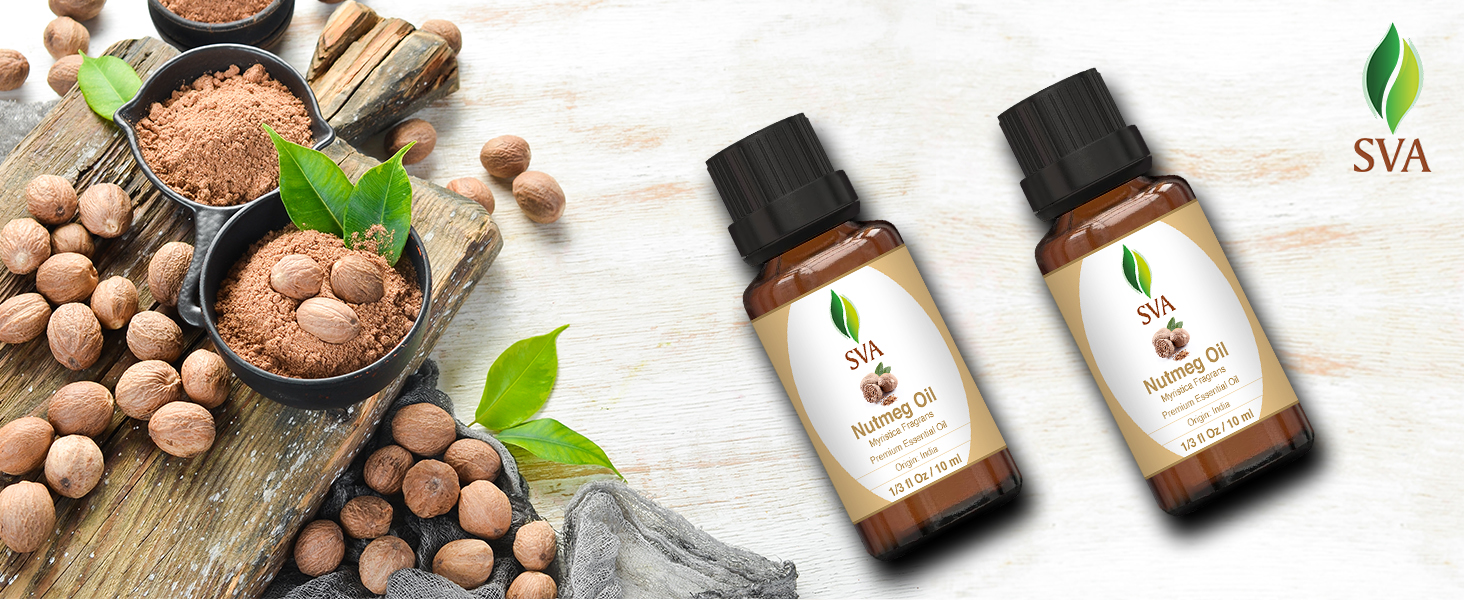 Two amber glass 10ml bottle of nutmeg essential oil alongside of raw nutmegs