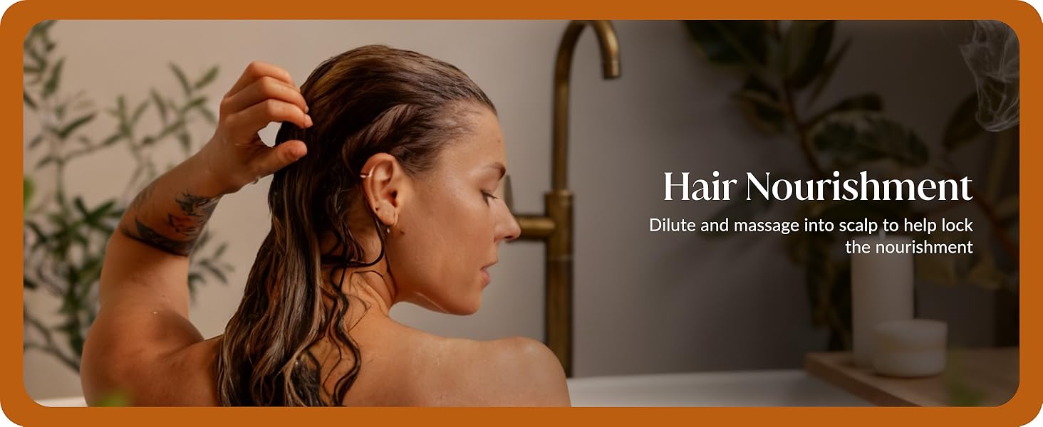 Person receiving scalp massage using turmeric essential oil from the 4 ounce bottle for haircare