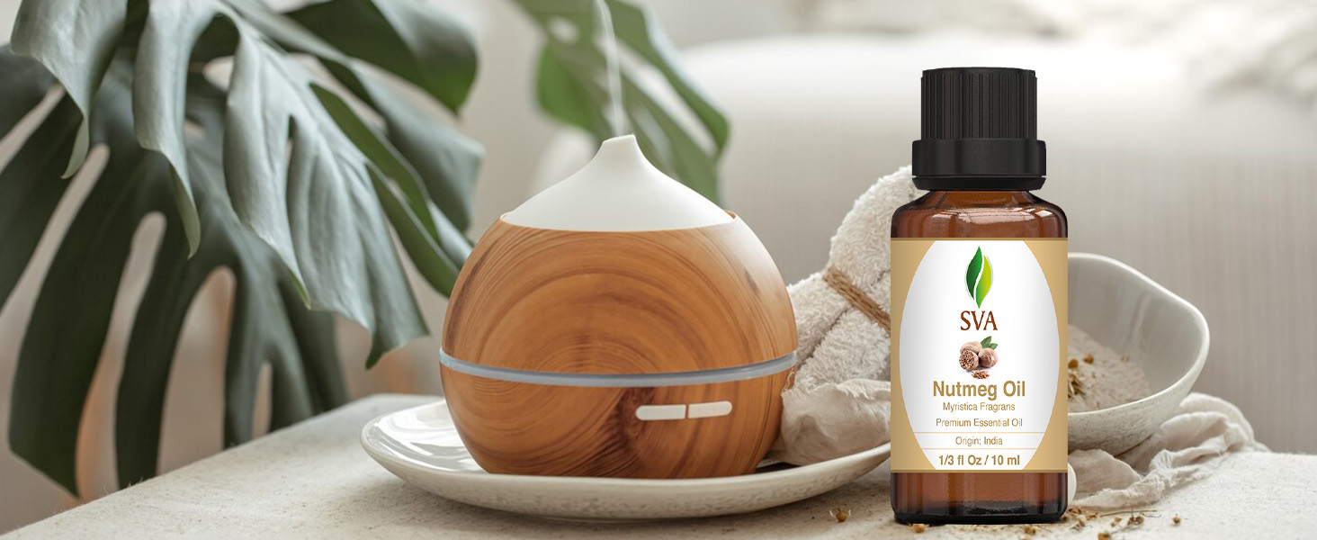An electric diffuser is being used with nutmeg essential oil for aromatherapy