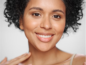 Woman with visibly firmer skin