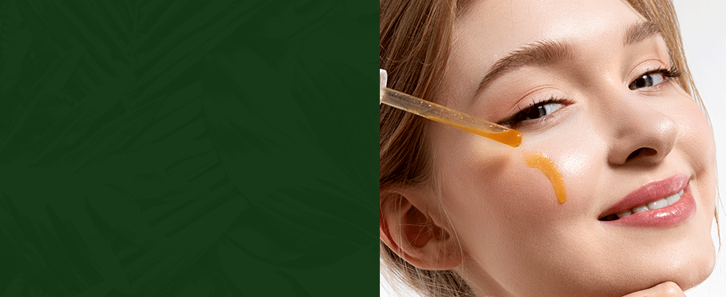 Young adult woman applying vitamin c serum