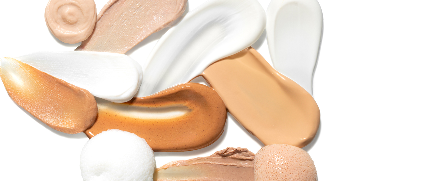 White background photo of all of Cotz all-mineral sunscreen swatches to show of different textures.