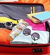 Jergens Citrus Body Butter in a suit case on top of clothes