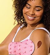 Woman using a Jergens Instant Sun Mitt on her arm