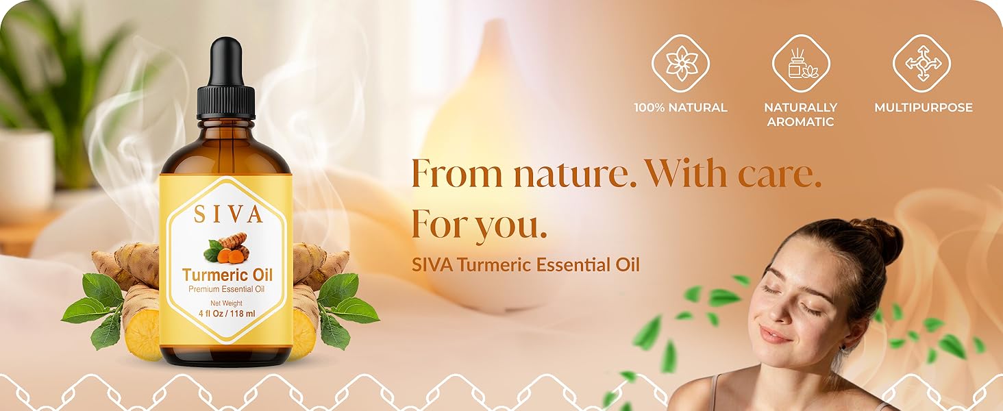 Amber glass 4 ounce bottle of turmeric essential oil alongside of turmeric powder and raw turmeric