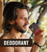 Man smelling deodorant