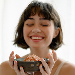 women smelling bath salt