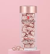 Elizabeth Arden Retinol + HPR Ceramide Capsules on a podium