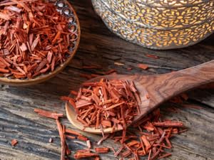 Sandalwood in a wooden spoon