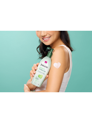 Jergens Pure Hydration Bottle. Woman Smiling.