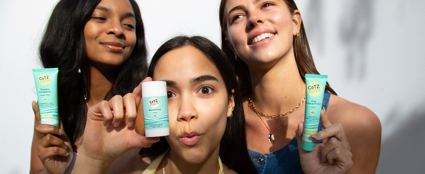 3 models holding Cotz products on white background with shadows cast from trees and the sun.