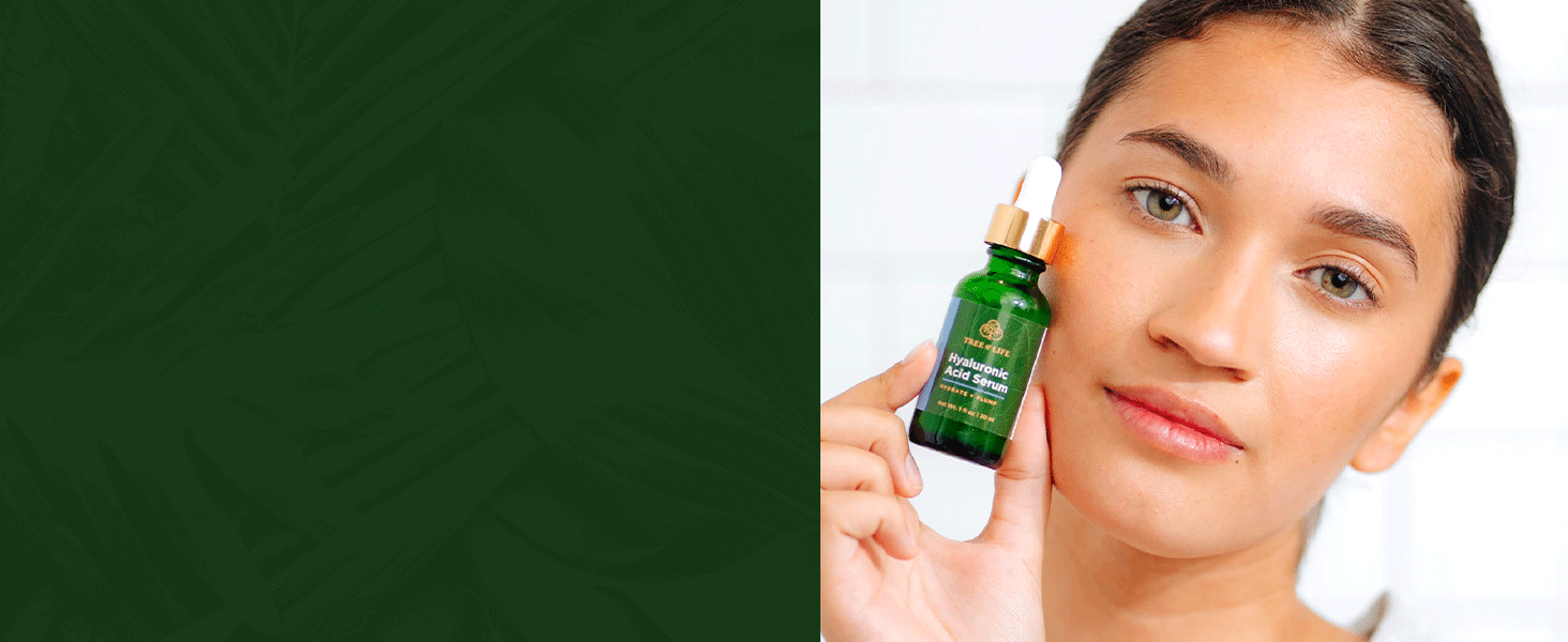 Young adult woman applying Hyaluronic acid serum