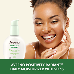 Woman applying Aveeno Positively Radiant Daily Face Moisturizer with SPF 15 sunscreen